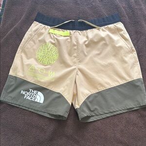 The North Face Tan and Green run Shorts